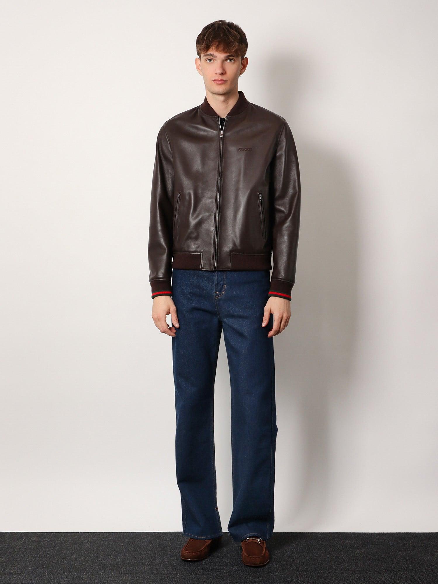 Leather jacket with Gucci embossed detail