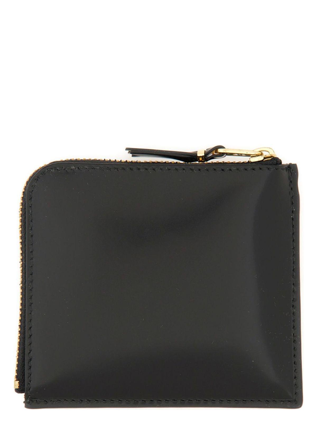 Comme Des GarÃ§ons Wallet Comme Des Garçons Leather Wallet in Black
